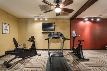 a gym with two bikes and a treadmill at Autumn Woods Apartments, Miamisburg, 45342